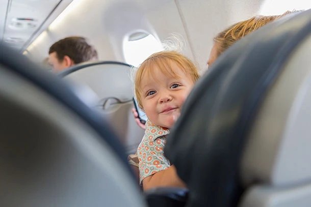 How to Travel With a Toddler on a Long Flight (Survival Guide)